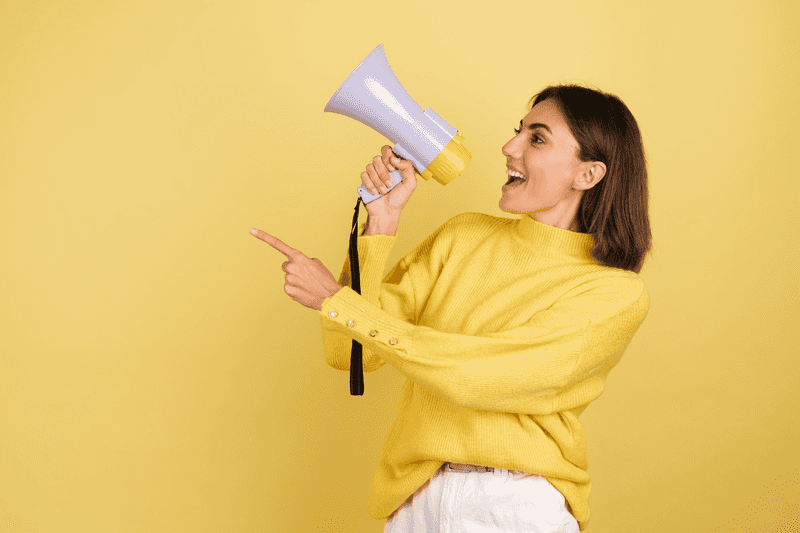 A person with a megaphone speaker